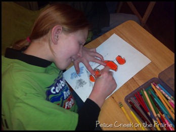 Working on her Creating a Masterpiece Colored Pencil Drawing 